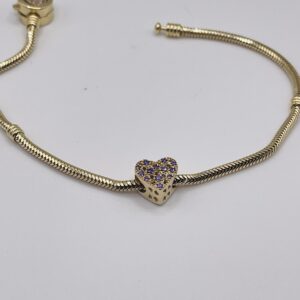 14k gold heart charm with purple zircon stones